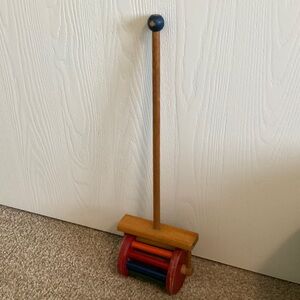 Classic Wooden Push Toy with Red and Blue Accents